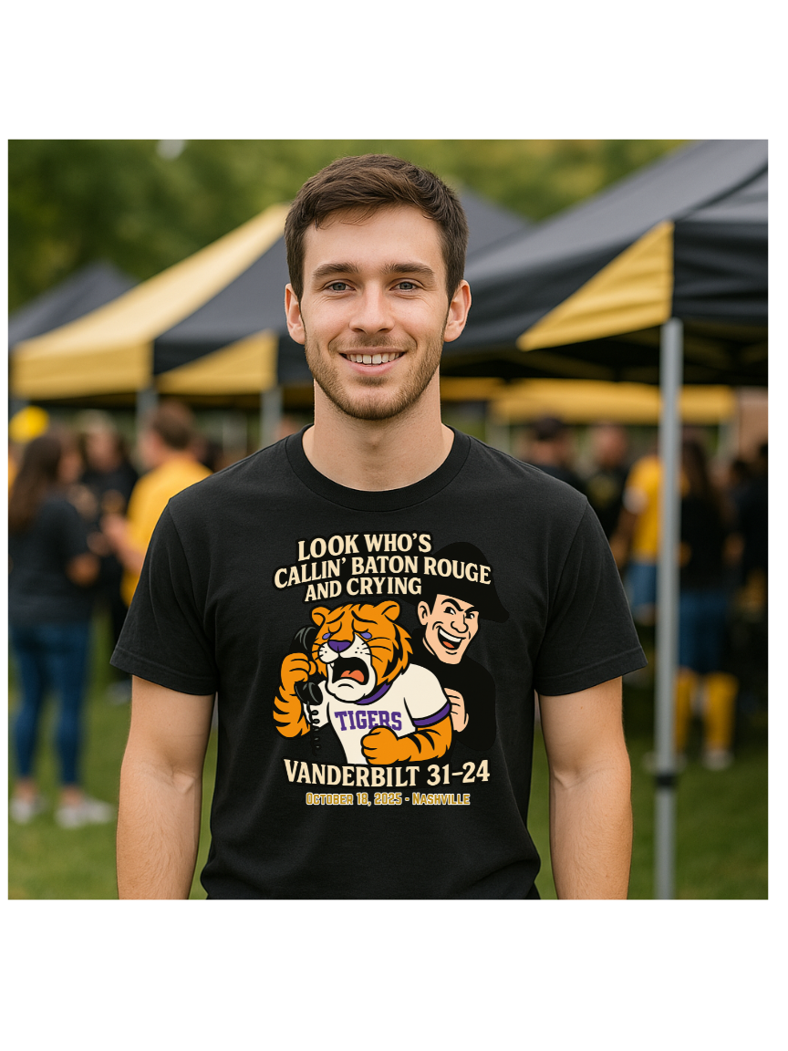 Vandy fan wearing score shirt featuring their 31-24 win over LSU